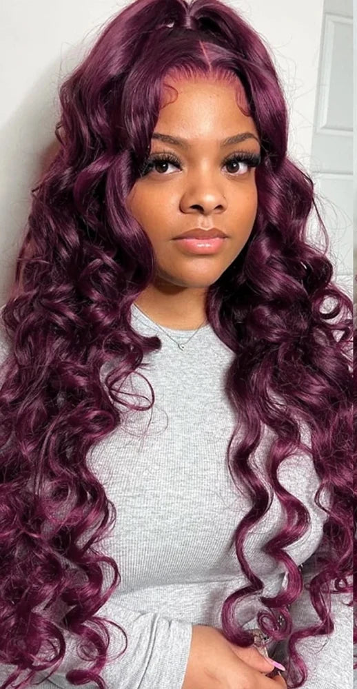 Model wearing wine red body wave wig 13x4 13x6 lace deep parting