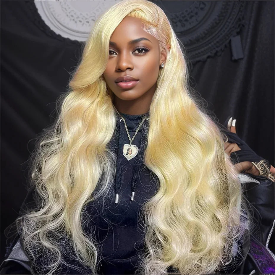 Model wearing Champagne Blonde Body Wave Wig with HD lace frontal, styled body wave with natural hairline.