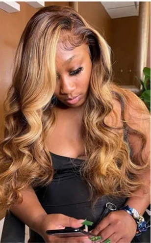 Model wearing Body Wave Blonde Glow – 13x4 HD Lace Front Wig, styled in soft body wave texture with natural hairline.