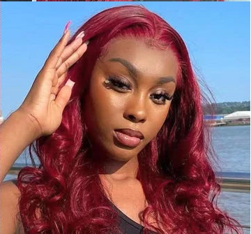 Model wearing Body Wave Wig – Transparent Lace 13x6/13x4 – 99J – Royal Voltage, styled with seamless lace and sculpted edges.