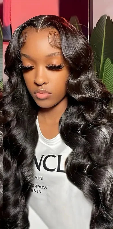 Model wearing Body Wave Wig HD Lace 13x4 – 1B – Everyday Flow, styled in soft waves with seamless lace melt.