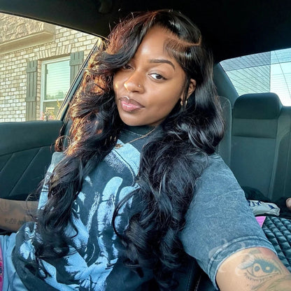 Model wearing Body Wave Wig – HD Lace 13x6 – Natural Black – Signal Flow, styled in soft waves with seamless lace melt and deep parting.