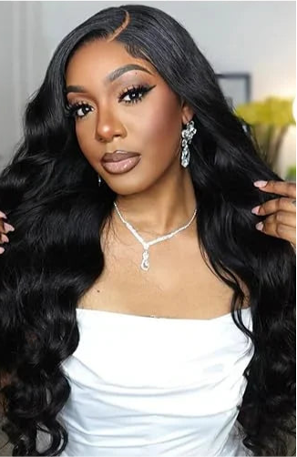Model wearing The Body Wave Fit – 4x4 HD Lace Glueless Wig with sculpted waves and pre-plucked hairline.