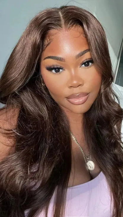 Model wearing Wig Body Wave HD Lace 13x4 – 34 Inch Chocolate Brown – Glow Cocoa, styled in soft waves with rich chocolate tone and transparent lace.