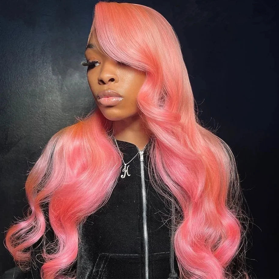 Model wearing Wig Body Wave HD Lace 13x6 – Pink – Glow Pop, styled soft glam with medium brown lace and radiant wave texture.
