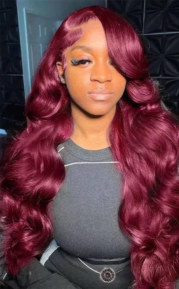 Model wearing Wig Body Wave Lace 13x6 – 36 Inch 99J Burgundy – Glow Wine, styled in soft waves with rich burgundy color and medium brown lace.