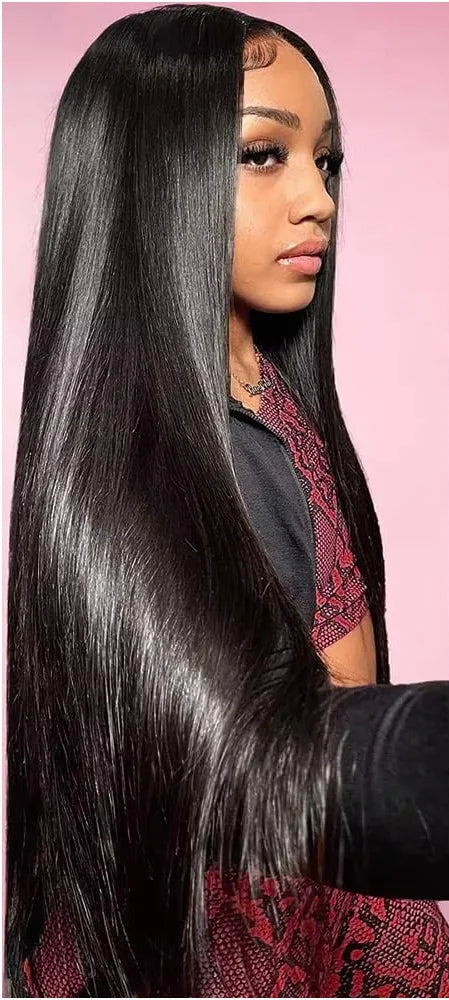 Model wearing Wig Straight HD Lace 13x6 – Natural Black – Jet Reign, styled sleek with transparent lace and polished silk press texture.
